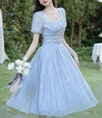 50's vintage-style dress depicts how to save on vin age fashion.