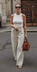 Woman sporting retro fashion for everyday wear showing that affordable retro vintage clothing is still available through this membership.