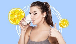 Young lady drinking alkaline water expressing the benefits of an alkaline body with baking soda