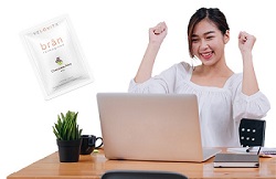 Happy college student who uses bran, the best brain supplement for focus and energy.